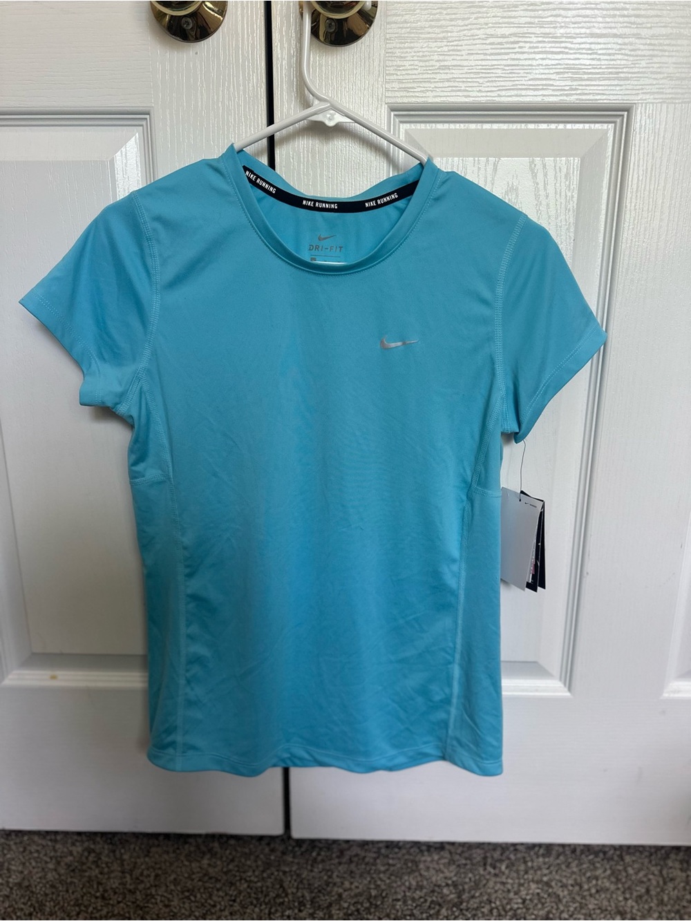 Nike Women's Short Sleeve Performance Tee in Aqua Blue Size M